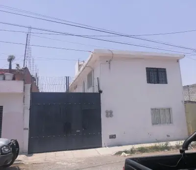 CASA CON 4 DEPARTAMENTOS EN VENTA