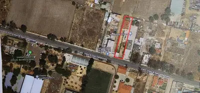 TERRENO CON CASA INCLUIDA