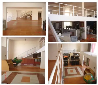 Edificio de locales con 8 departamentos en circuito potosi