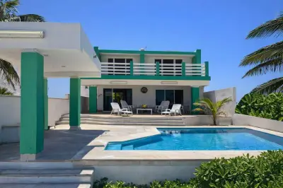 Venta de residencia frente al mar en chixchulun puerto