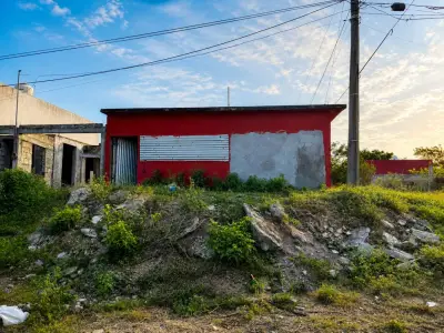 Terreno con construccion en obra negra